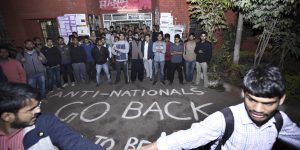 NEW DELHI, INDIA - FEBRUARY 12: ABVP Students protest against the organisers of the event on Afzal Guru where slogans were anti-national slogans were raised at JNU Campus on February 12, 2016 in New Delhi, India. JNU students union president Kanhaiya Kumar was arrested on in connection with a case of sedition and criminal conspiracy over holding of an event at the prestigious institute against hanging of Parliament attack convict Afzal Guru in 2013. A group of students on Tuesday held an event on the JNU campus and allegedly shouted slogans against India. (Photo by Arun Sharma/Hindustan Times via Getty Images)