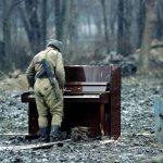 a-russian-soldier-plays-an-abandoned-piano-in-chechnya-1994