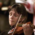 a-violinist-cries-while-playing-at-a-911-memorial-service-in-vancouver