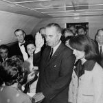 jacqueline-kennedy-in-her-suit-stained-with-her-husbands-blood-right-after-his-assassination-as-lyndon-johnson-takes-the-oath-on-22nd-november-1963