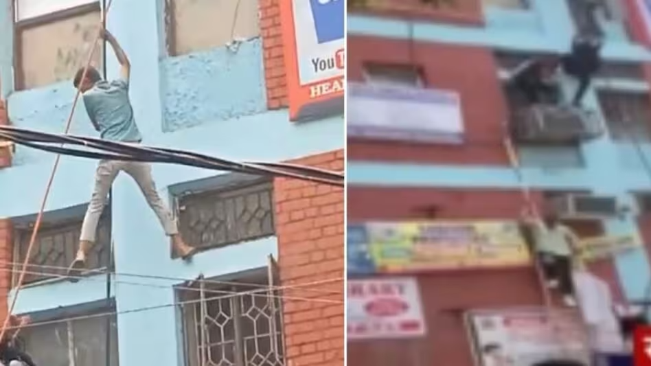 Watch Viral Video: Fire Breaks Out At Sanskrit Coaching Center in Mukherjee Nagar Delhi News | Fire in Gyana Building Near Batra Cinema | Delhi Coaching Class Fire Accident Update