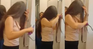 Girl Grooming Hair in Delhi Metro Video Viral on Social Media | Girl Straightens Her Hair With Hair Straightener Inside Delhi Metro Watch Viral Video | लड़की ने दिल्ली मेट्रो के अंदर हेयर स्ट्रेटनर से अपने बालों को सीधा किया!