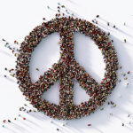 Human Crowd Forming A Symbol Of Peace