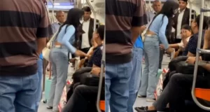 Delhi Metro Boy and Girl Fight Viral Video | Video of girl beating boy in Delhi Metro goes viral, people say- 'Put him in jail' | दिल्ली मेट्रो में लड़के को पीटती लड़की का वीडियो वायरल, लड़की ने लड़के को जड़ा थप्पड़